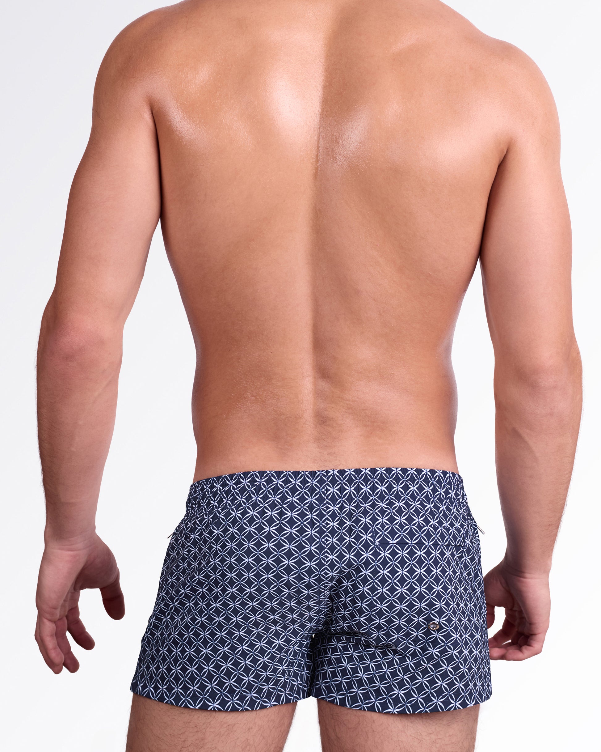 DC2 Mono Waves (Blue) Poolside Shorts — back view highlighting the all-over blue geometric pattern and rear pocket detail on the tailored short-length silhouette.