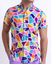 Male model wearing MOSAIC men’s sleeveless stretch shirt, with a stylish multi-color mosaic shape design for men. This premium quality top is by BANG! Clothes, a men’s beachwear brand from Miami.
