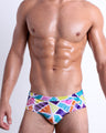 Front view of the MOSAIC Swim Brief, men’s bikini-style bottoms a retro abstract colorful mosaic pattern, this brief was designed by BANG! Clothes in Miami.