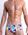 Front view of the MOSAIC Summer swim Brazilian Sunga, men’s bikini-style bottoms a retro abstract colorful mosaic pattern, this Sunga was designed by BANG! Clothes in Miami.