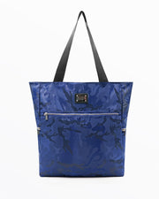 The NAVY BLUE CAMO Poolside Tote Bag by DC2 Miami, features a bold blue camouflage design. This bag is a perfect companion for beach outings, shopping trips, or everyday use.