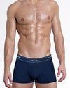 Model wearing BANG! Skin Soft Boxer Briefs in Navy Blue, featuring a rich navy finish, supportive contour pouch, and an ultra-soft, second-skin feel.