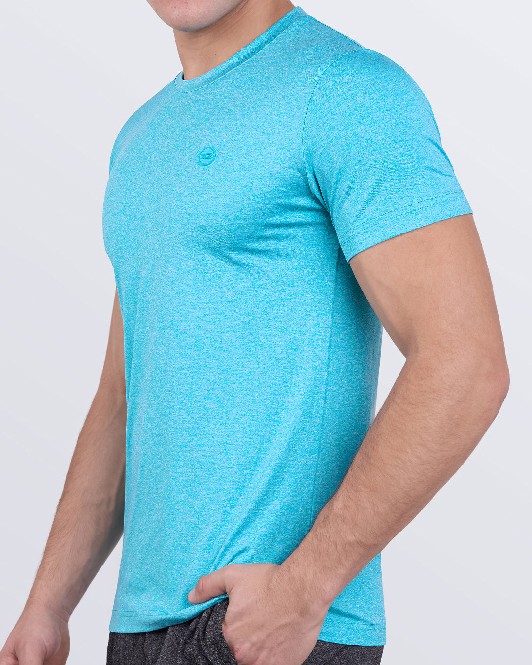 DC2 Olympic Blue Fitness T-shirt — side view highlighting contoured sleeves and flexible, movement-friendly design.