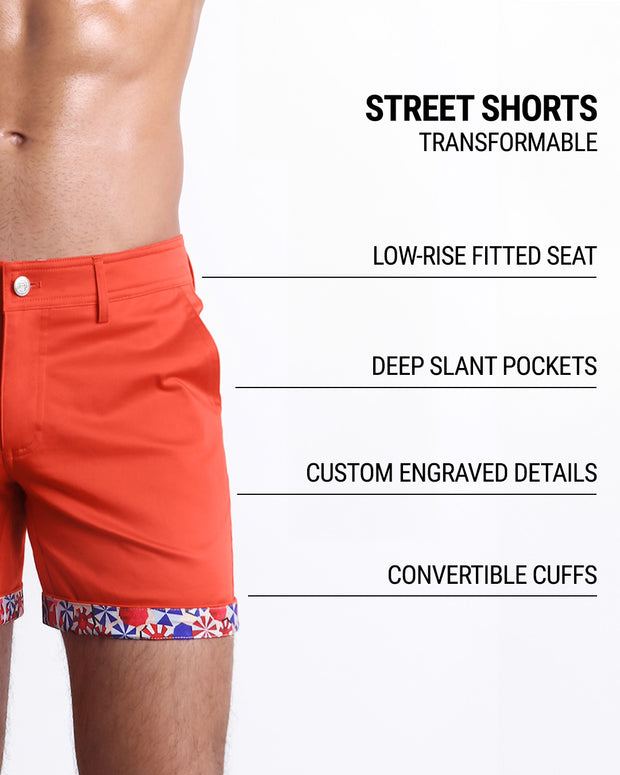 Men tailored fit chino shorts in ORANGE FLOW by DC2 Keeps you feeling comfortable and looking sharp all. Classic chino shorts for men in a cotton blend from DC2 Clothing from Miami. Features two front pockets and custom engraved button front closure with zip fly. Can roll-up cuffs for shorter length and showing internal print. Or hem down for a mid-thigh length and full-solid white color showing.