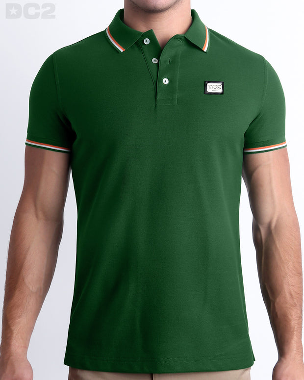 Front view of the PALM GREEN Polo Shirt. It features a slim fit and short sleeves for a modern twist. Made from Peru&