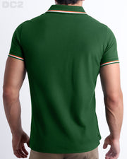 Back View of the PALM GREEN Premium Cotton Polo Shirt for Men in solid dark green with white and orange stripes on ribbed-knit collar and cuffs. The short-sleeve classic polo shirt is designed by DC2 in Miami.