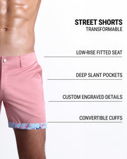 Men tailored fit chino shorts in PINK ILLUSIONS by DC2 Keeps you feeling comfortable and looking sharp all. Classic chino shorts for men in a cotton blend from DC2 Clothing from Miami. Features two front pockets and custom engraved button front closure with zip fly. Can roll-up cuffs for shorter length and showing internal print. Or hem down for a mid-thigh length and full-solid pink color showing.