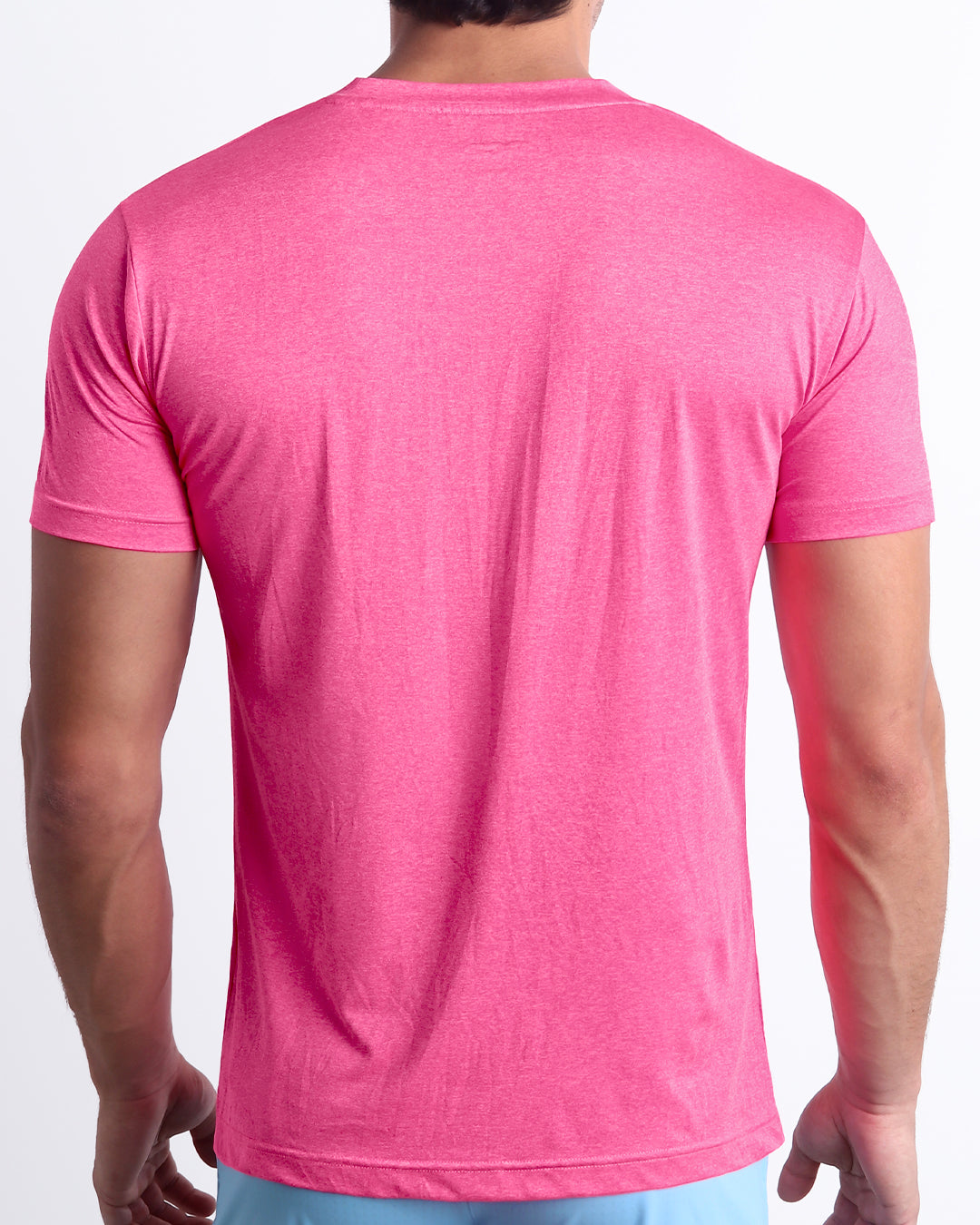 Back view of the Pinktensity Workout T-Shirt showcasing a clean athletic silhouette, breathable performance fabric, and comfortable fit.