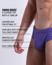 Infographic explaining the classic cut with a tune-up PURPLE MACHINE Swim Brief by DC2. These men swimsuit is low-rise seat for optimal fit, available with or without 'Full-Pack' insert, comfier front pouch, and fully lined inside.