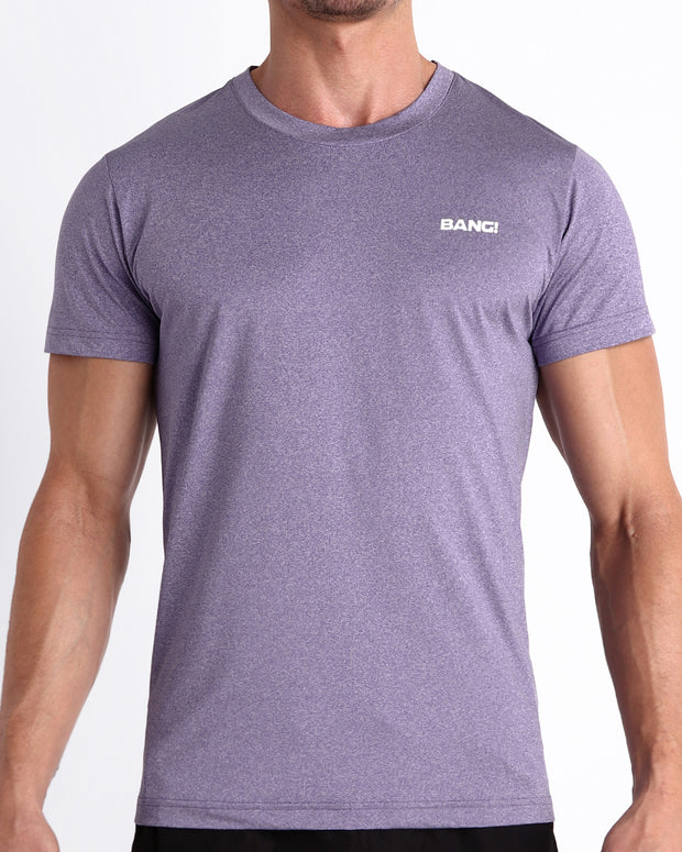 Frontal view of male model wearing the PURPLE MARVEL in a solid marbled purple color quick-dry workout shirt by the Bang! brand of men&