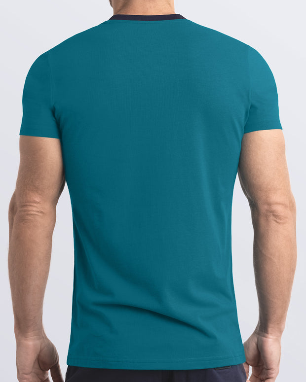 Back view of a vibrant teal men&