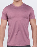 DC2 RIPPED CRIMSON Fitness T-Shirt — model wearing short-sleeve athletic shirt in a crimson-red heather tone, designed for performance workouts.