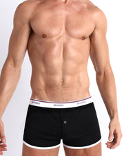 Front view of sexy male model wearing the RISKY BLACK soft cotton underwear for men by BANG! Clothing the official brand of men's underwear.