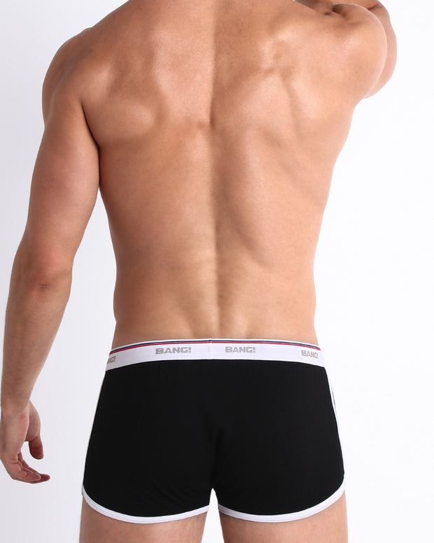Back view of model wearing the RISKY BLACK men’s beathable cotton boxer briefs for men by BANG! Underwear trunks provide all-day comfort and secure fit.