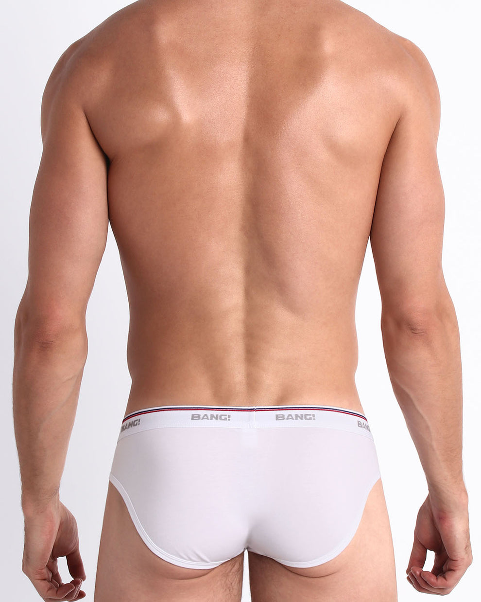 Back view of model wearing the RISKY WHITE from the Retro line Men’s breathable cotton briefs for men by BANG! Offers light compression for perfect contouring to the body and second-skin fit.