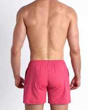 Back view of the ROCKY PINK men's fitness sweatshorts in a dark pink color by BANG! menswear Miami.