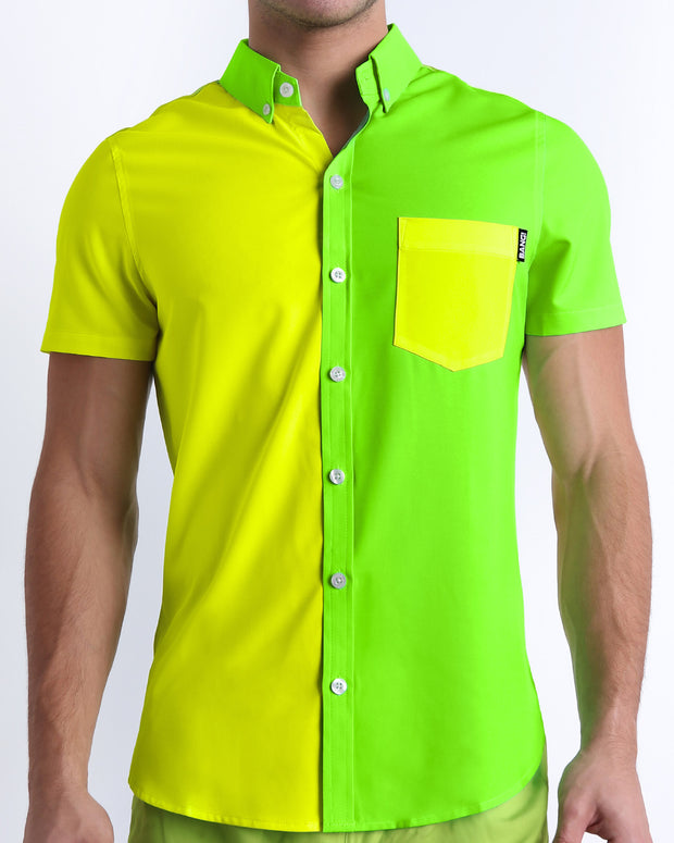 Side view of the SINGLE BILINGUAL (NEON YELLOW/GREEN) Hawaiian-inspired Stretch Shirt for men features a vibrant with fluorescent colors, a bright lime green hue on the left side, and a yellow shade on the right designed by BANG! Clothes in Miami.