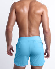 Back view of the SKY BLUE men's fitness compression lined workout shorts in a vibrant light blue color. These premium quality quick-dry endurance shorts are DC2 by BANG! Clothes, a men’s beachwear brand from Miami.