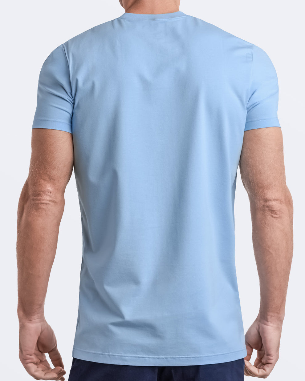 Back view of a sky blue men's t-shirt, made from soft, durable and breathable modal cotton. Part of the DC2 Miami men's streetwear and beachwear collection, ideal for casual summer outfits