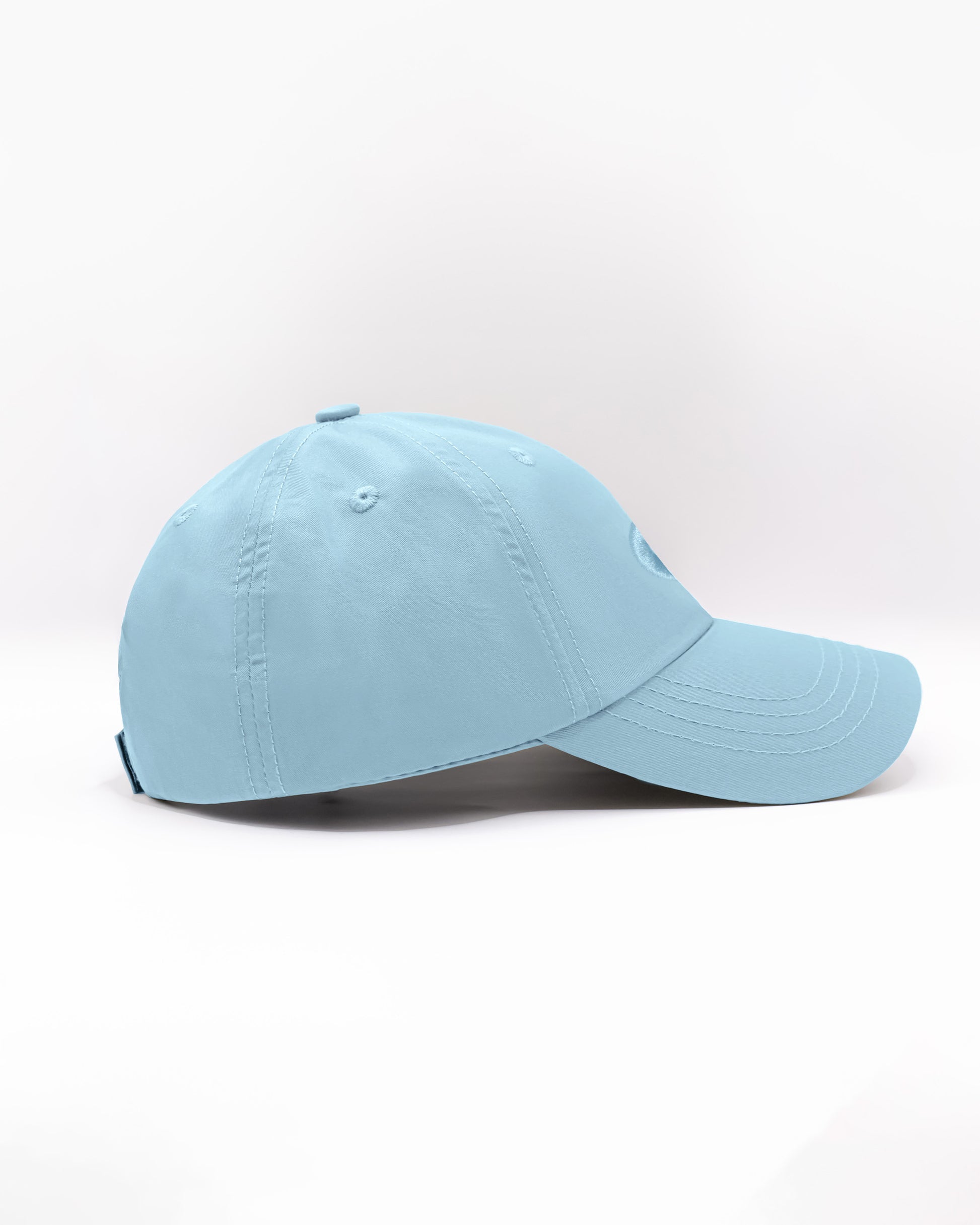 DC2 Resort Cap in Sky Blue — side view showing the low-profile fit, curved brim, and smooth cotton twill finish.