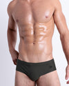 DC2 SLIM GREEN Swim Briefs — model wearing slim green swim brief, featuring low-rise fit and sleek minimalist cut.