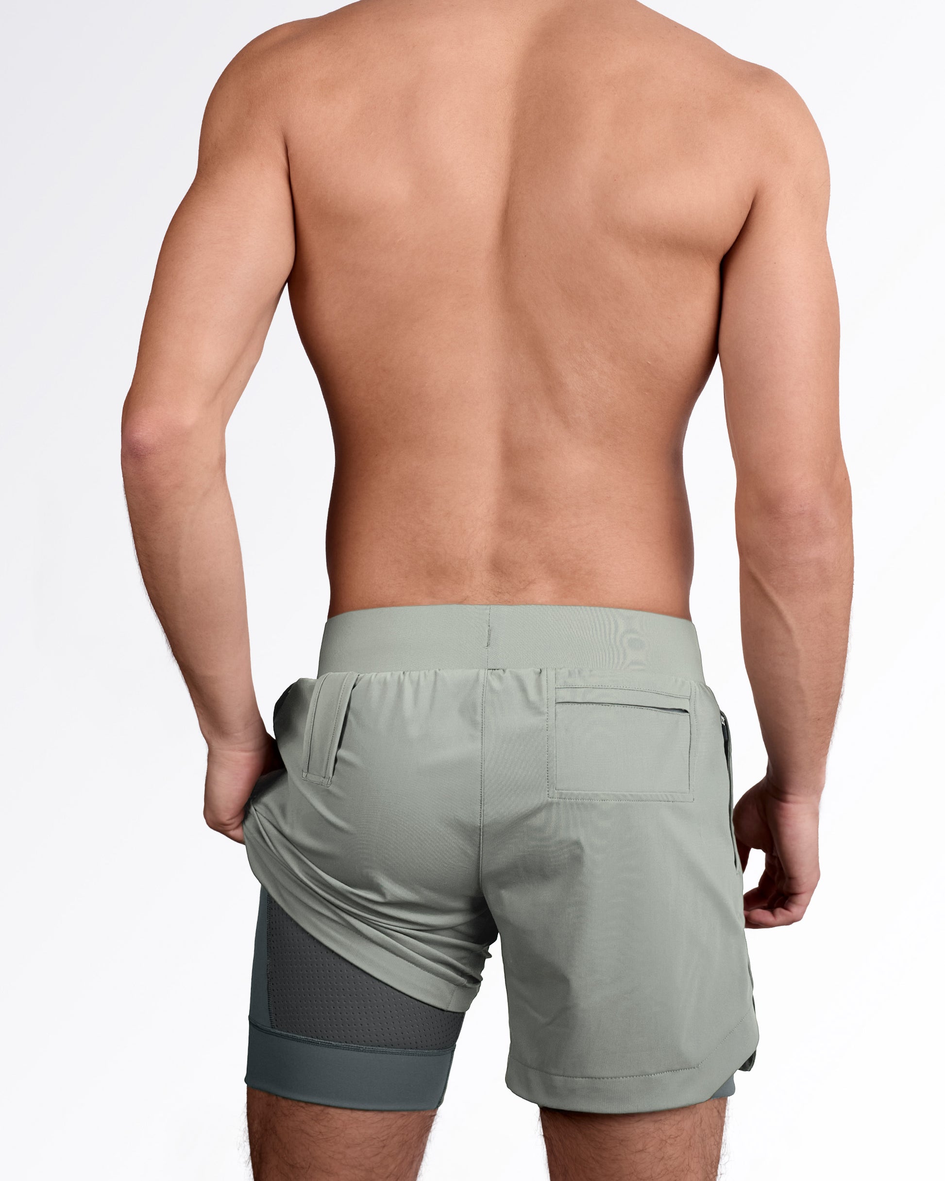 Back side of men's gym workout shorts in space gray color, showing internal liner, from DC2 Miami fitness menswear.