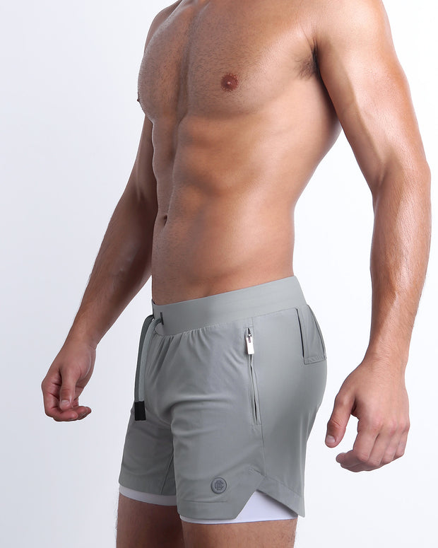 Side view of men’s performance exercise shorts in a solid grey color made made by DC2 the official brand of mens sportswear.
