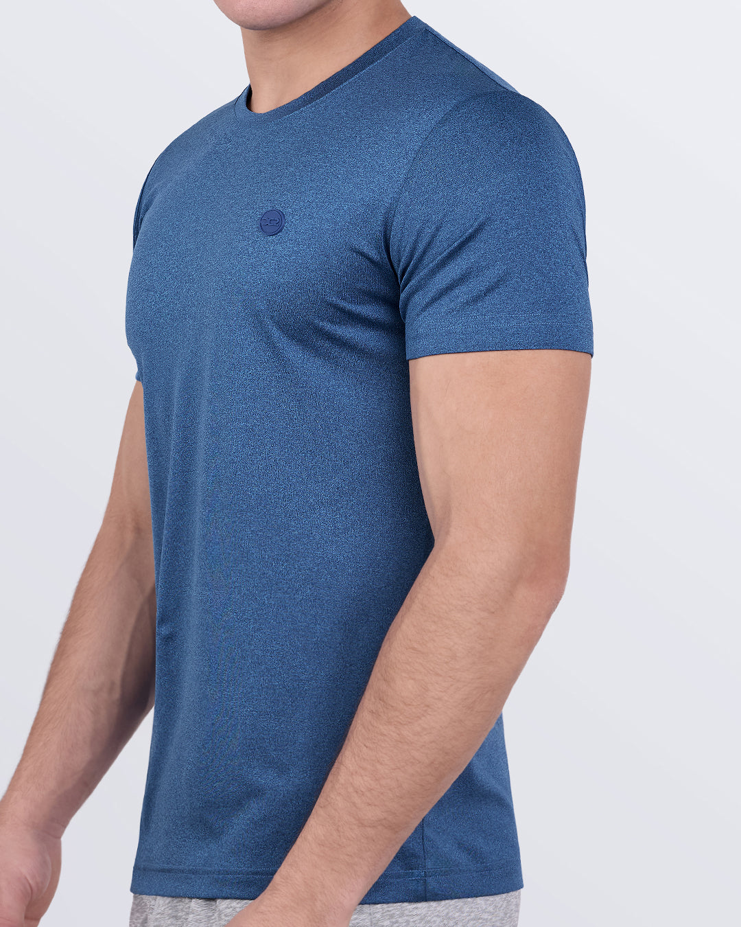 DC2 STEEL BLUE Fitness T-shirt — side angle showing contour-hugging silhouette and flexible stretch design.