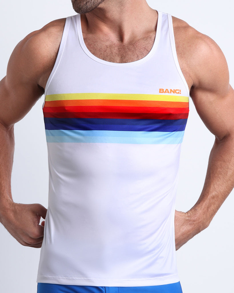 Frontal view of male model wearing the STRIPES ON 45 men's beach tank top by the Bang! Clothes brand of men's swimwear from Miami.