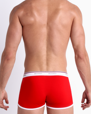 Back view of a model wearing the SUPERB RED a vibrant red men’s breathable cotton boxer briefs for men by BANG! Underwear trunks provide all-day comfort and a secure fit.