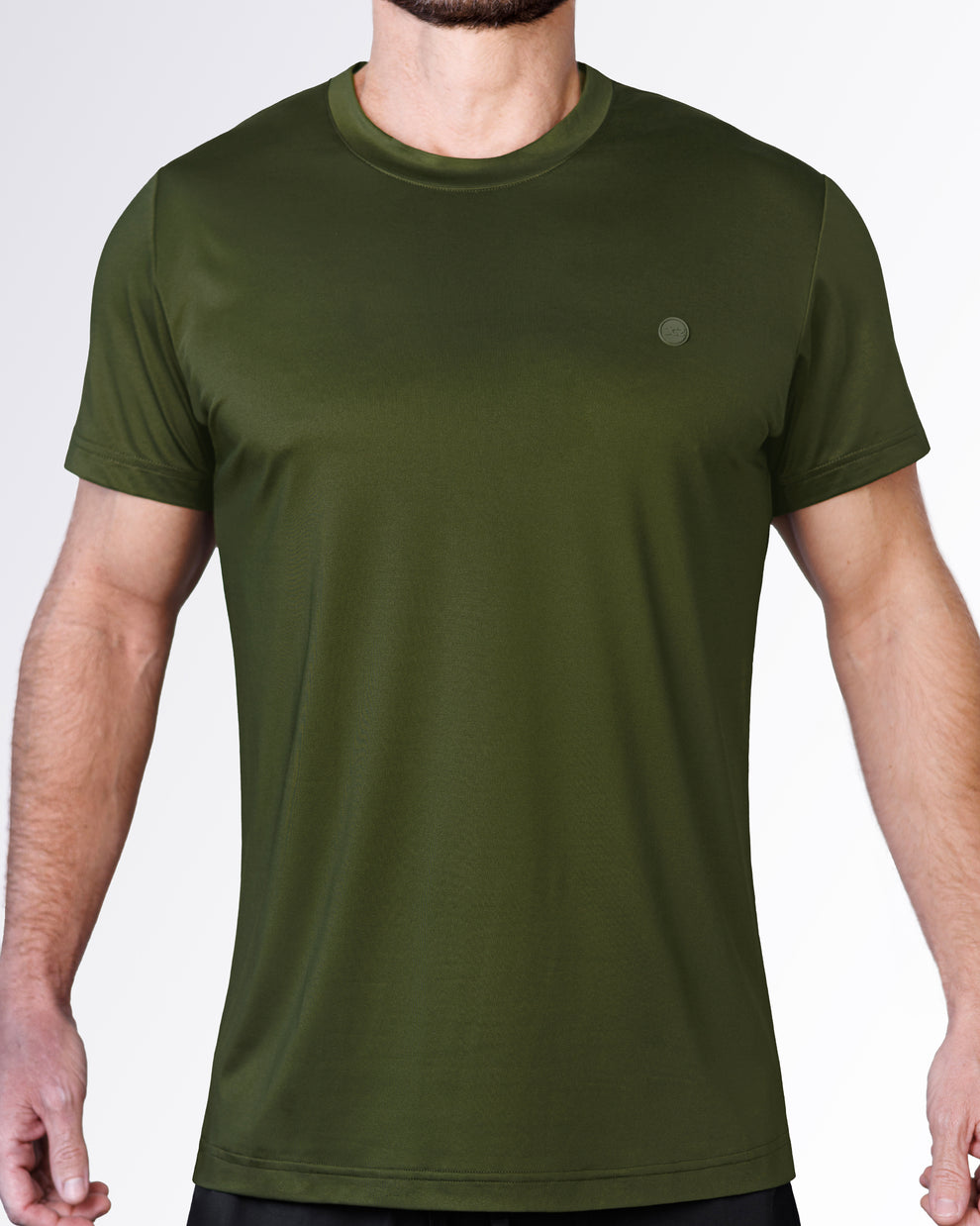 Model wears the SUPERSET Fitness T-Shirt in green, featuring a classic crew neck, short sleeves and subtle tonal DC2 logo detail.