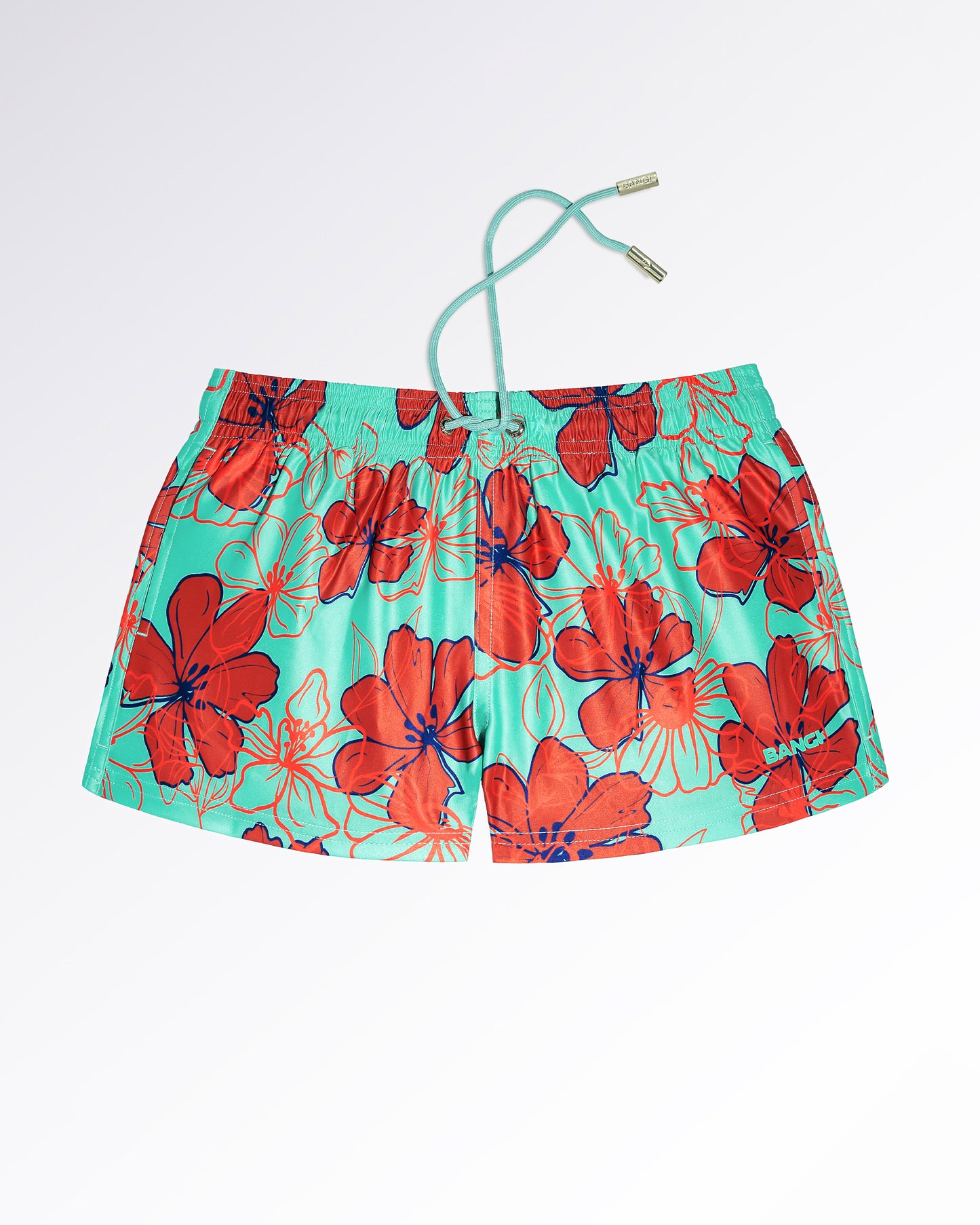 BANG! Miami Surf Flowers (Red/Aqua) Show Shorts — flat lay of aqua green show shorts with oversized red tropical floral print and blue outline detailing.