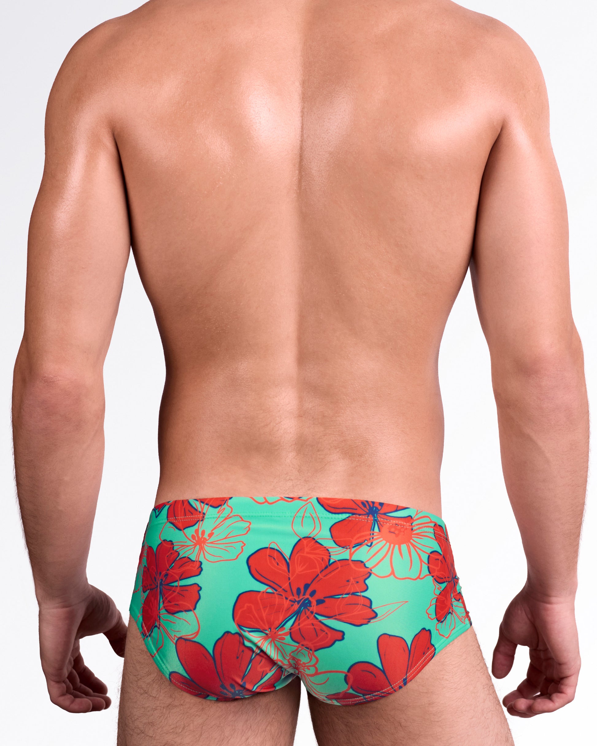BANG Surf Flowers (Aqua/Red) Swim Sunga — back view showcasing full tropical floral coverage, smooth tailored rear fit, and mid-rise waistband design.