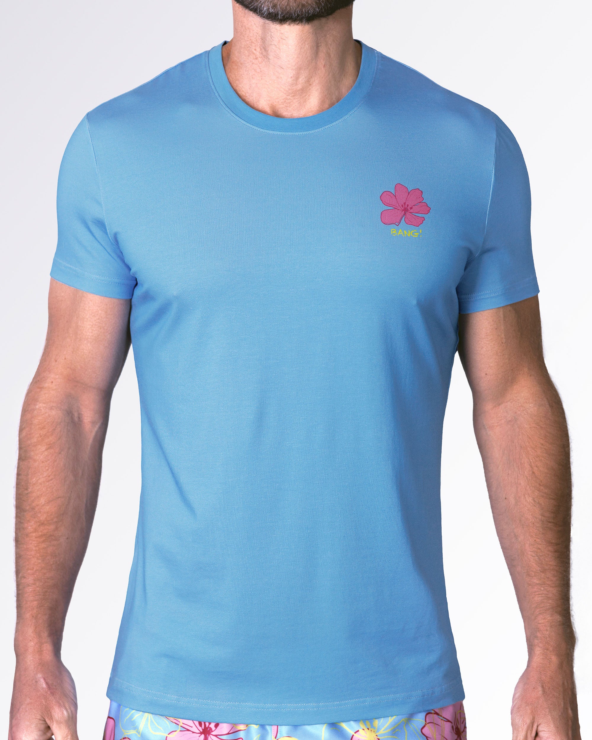 BANG! Miami Flower Powers Graphic Tee in sky blue with a pink floral chest logo, lightweight men's crew neck T-shirt, perfect for resort wear and summer outfits.