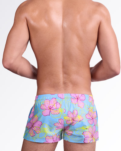 BANG Surf Flowers (Pink/Blue) Show Shorts — back view showcasing the vibrant floral print and tailored short-length cut designed for a sleek beach-ready silhouette.