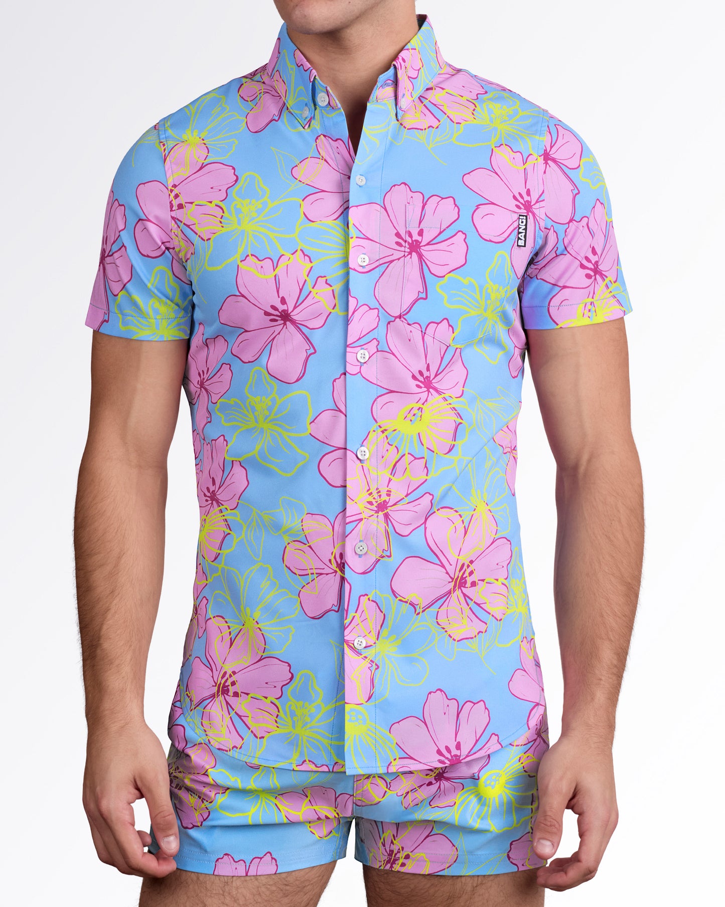 BANG! Surf Flowers (Pink/Blue) Stretch Shirt — styled with matching swim shorts, highlighting coordinated floral set and bold summer color contrast.
