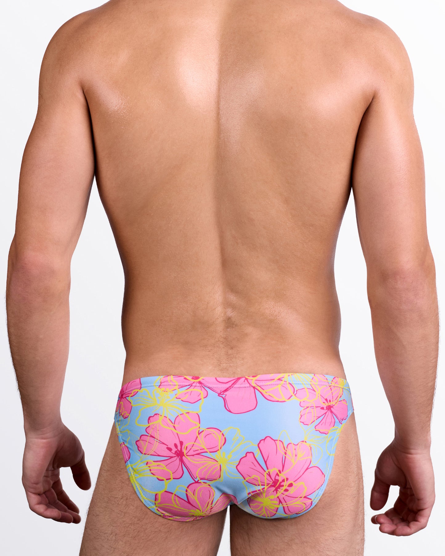 BANG Surf Flowers (Pink/Blue) Swim Mini Brief — back view showcasing full floral coverage, smooth stretch fabric, and minimal seat coverage design.