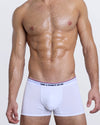 DC2 TAKE A CHANCE ON ME Boxer Brief — model wearing white men’s modal boxer briefs with logo waistband and contoured fit.