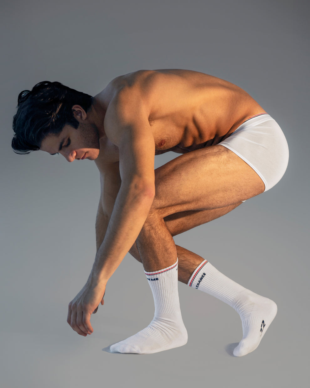 Model wearing DC2 Take My Breath Away Modal Boxer Briefs and matching socks.