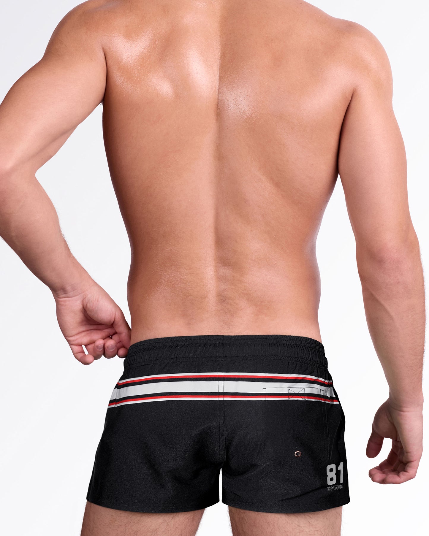 Men's black show shorts inspired by classic hockey uniforms, featuring white and red stripe accents, rear pocket detail, and vintage sportswear design.