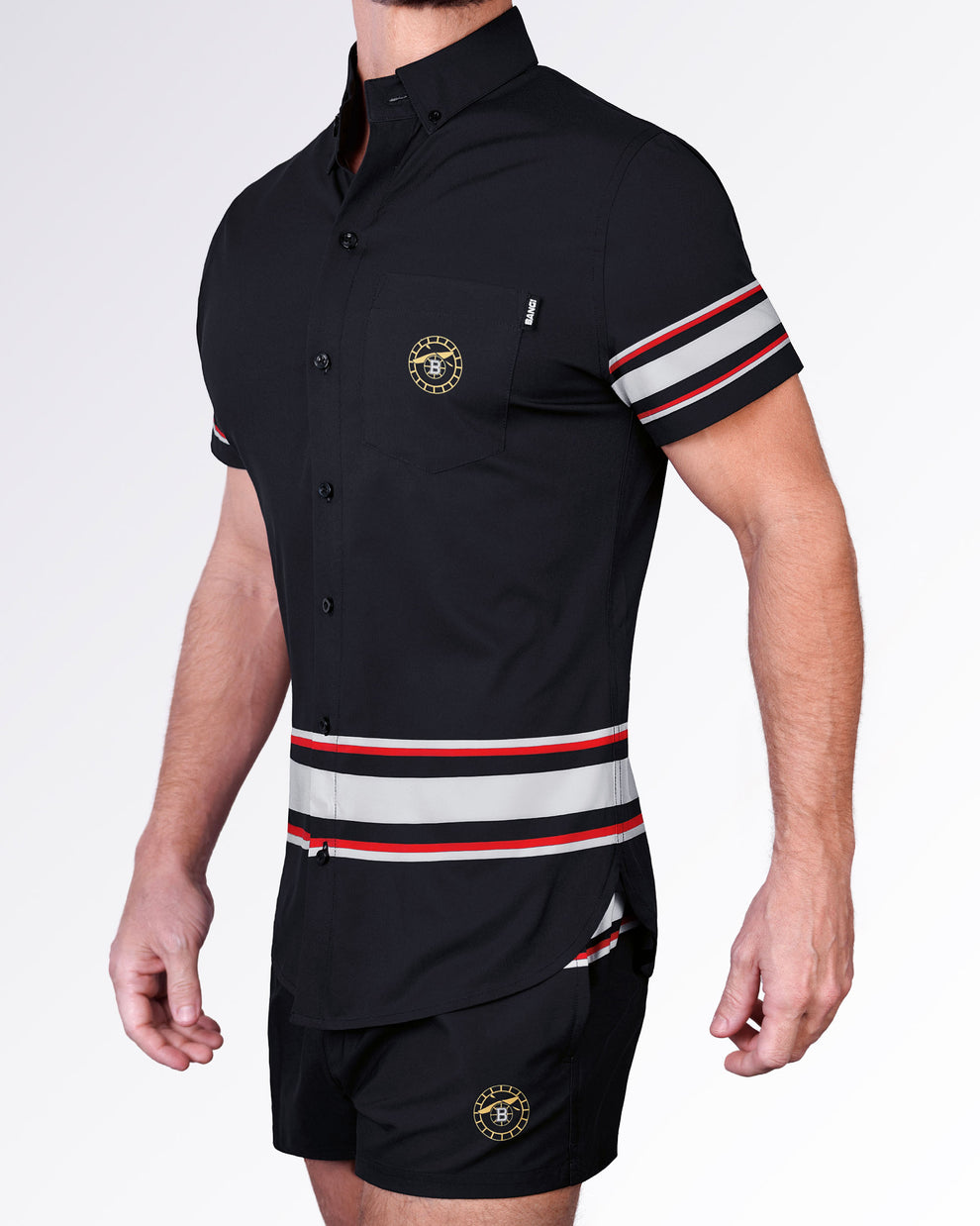 Side view of the Ilya Stretch Shirt showcasing athletic stripe accents, tailored short-sleeve construction, and lightweight stretch comfort.