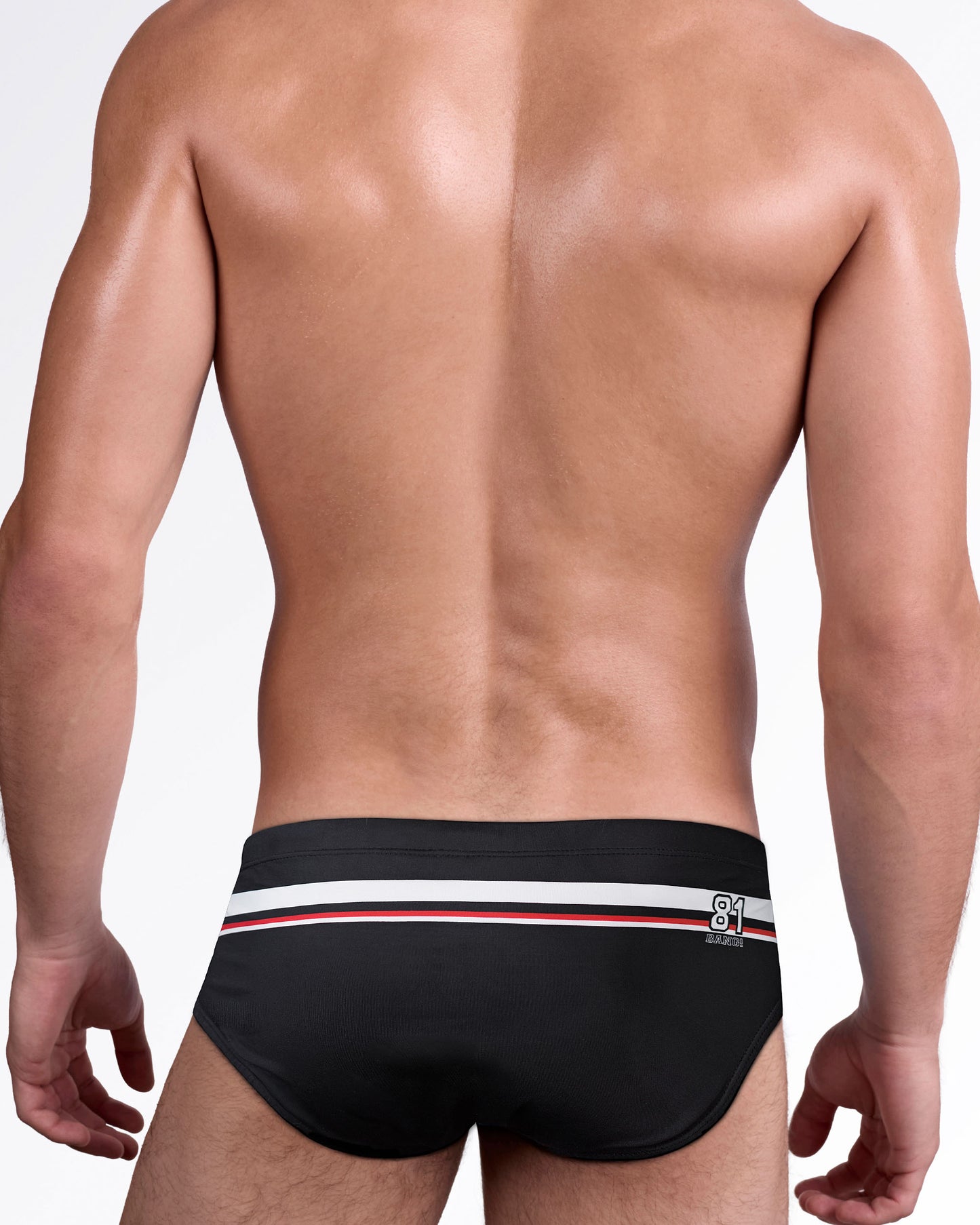 BANG Heated Rivalry Ilya Swim Sunga — back view showcasing the black design, contrast athletic waistband stripes, and hockey-inspired team detailing.