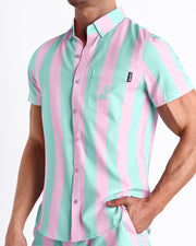 Side view of THE KEN (MALIBU EDITION) Hawaiian-inspired Stretch Shirt for men featuring pink and light aqua green colored stripes designed by BANG! Clothes in Miami.