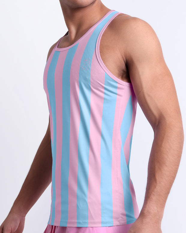Side view of the THE KEN (IBIZA EDITION) for men’s summer Tank Top. Inspired by the Barbie movie SoBe/Art-Deco-pastels is vibrant with light pink and blue colored stripes, this top is designed by BANG! Clothes in Miami.