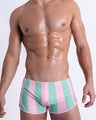 Front view of THE KEN (MALIBU EDITION) men’s sexy bottoms with light pink and aqua colored stripes by Bang Clothing, inspired by the style as seen worn by Ryan Gosling as Ken, in the Barbie movie.