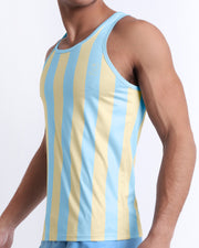 Side view of the THE KEN (MIAMI EDITION) for men’s summer Tank Top. Inspired by the Barbie movie SoBe/Art-Deco-pastels in pastel yellow and sky blue stripes, this top is designed by BANG! Clothes in Miami.