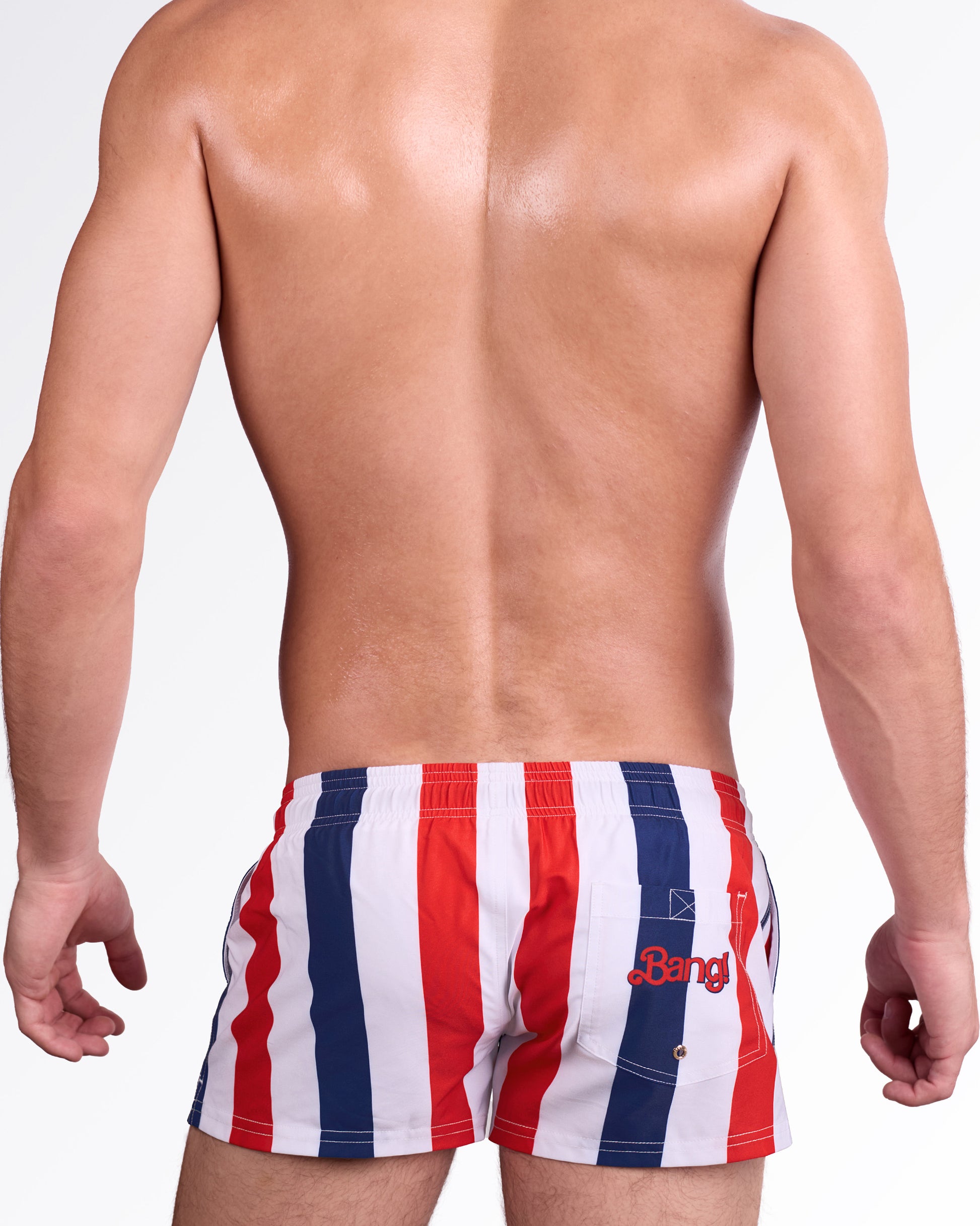 BANG The Ken (Saint-Tropez Edition) Show Shorts — back view showcasing the bold striped pattern, rear pocket with signature Bang! logo detail, and clean resort-ready fit.