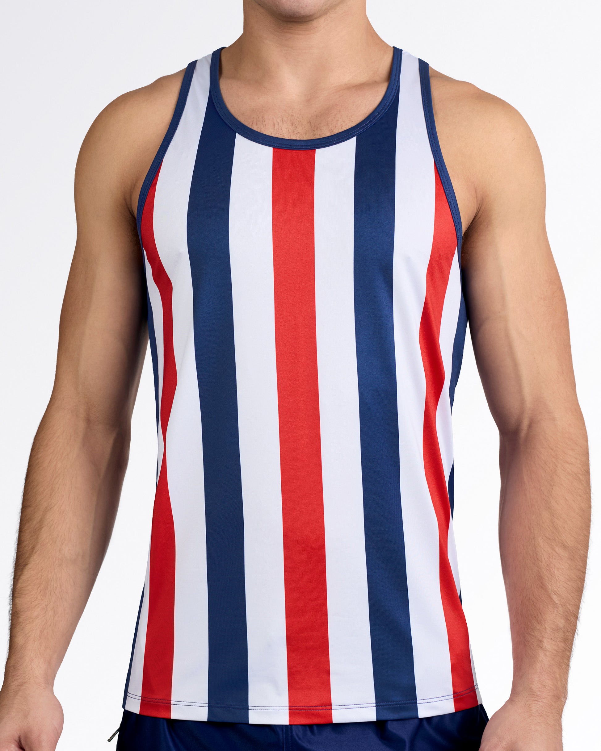 BANG The Ken (Saint-Tropez Edition) Gym Tank Top — model wearing red, white, and navy vertical stripe men’s tank with athletic cut and navy binding trim.