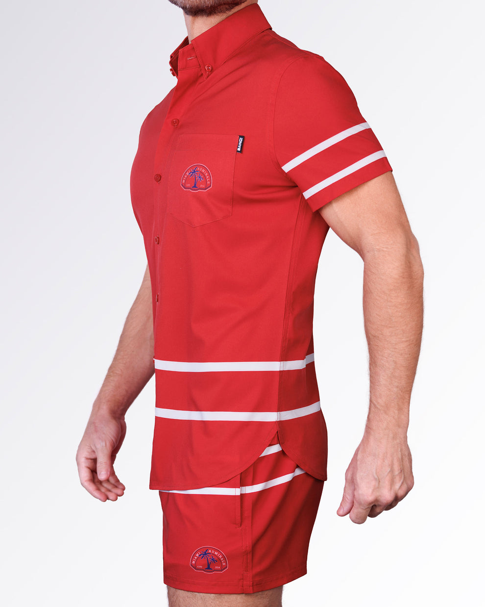 Side view of the Scott Stretch Shirt showcasing athletic stripe accents, tailored short-sleeve silhouette, and lightweight stretch construction.