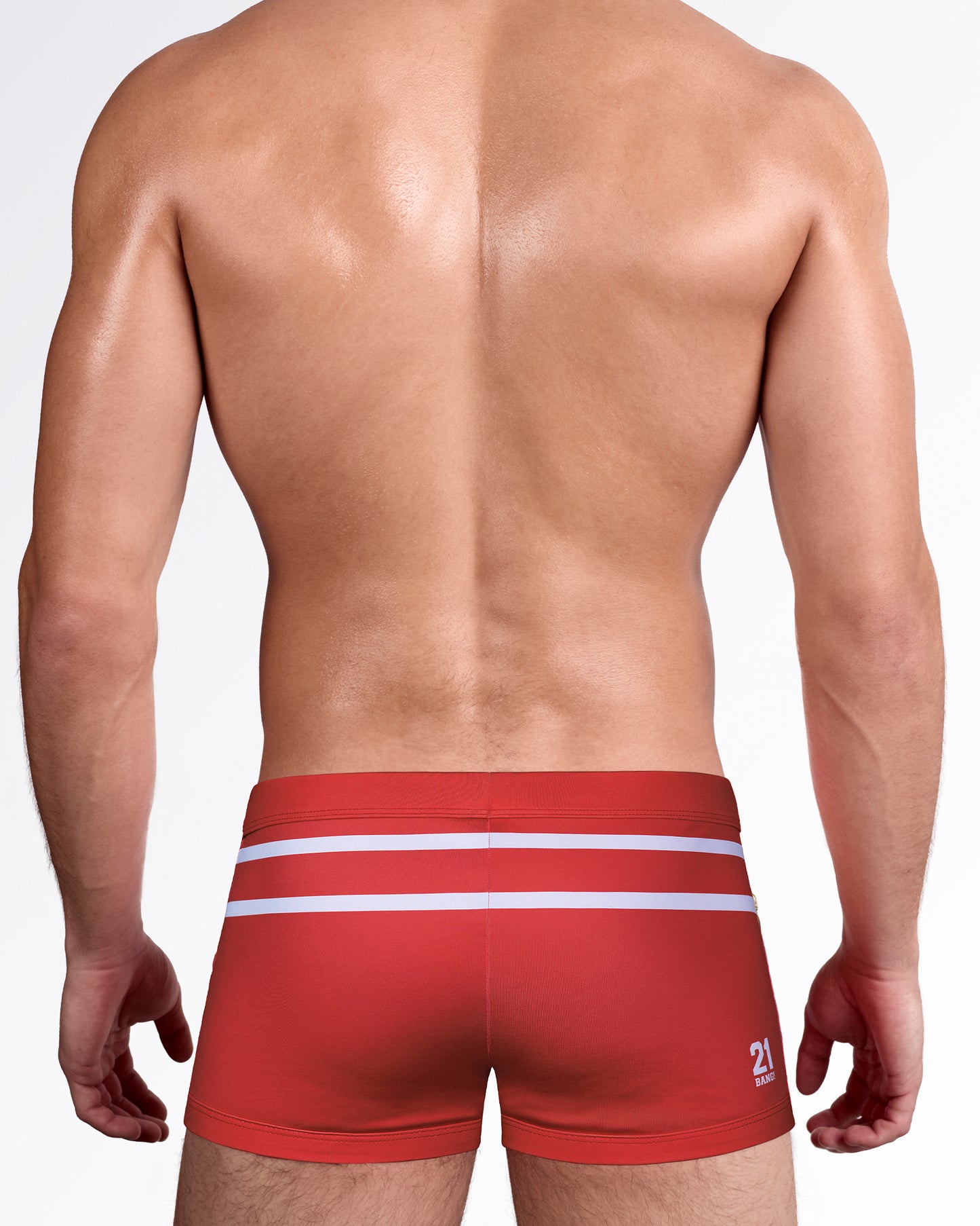 Back view of The Scott Swim Trunks showcasing the athletic square-cut fit, wraparound white stripe detail, and premium men's swim trunks design.
